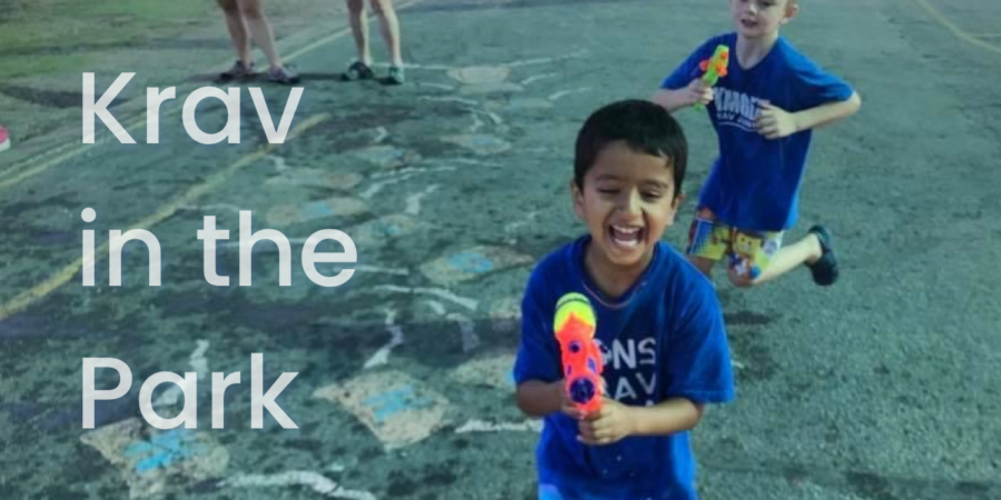 Two children running at a park with squirt guns. Words say: Krav in the Park. It's an announcement for the annual Krav Junior gun safety event at Lions Krav Maga.